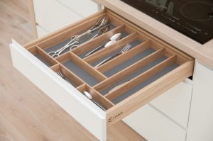 Drawer with insert for tools in the kitchen